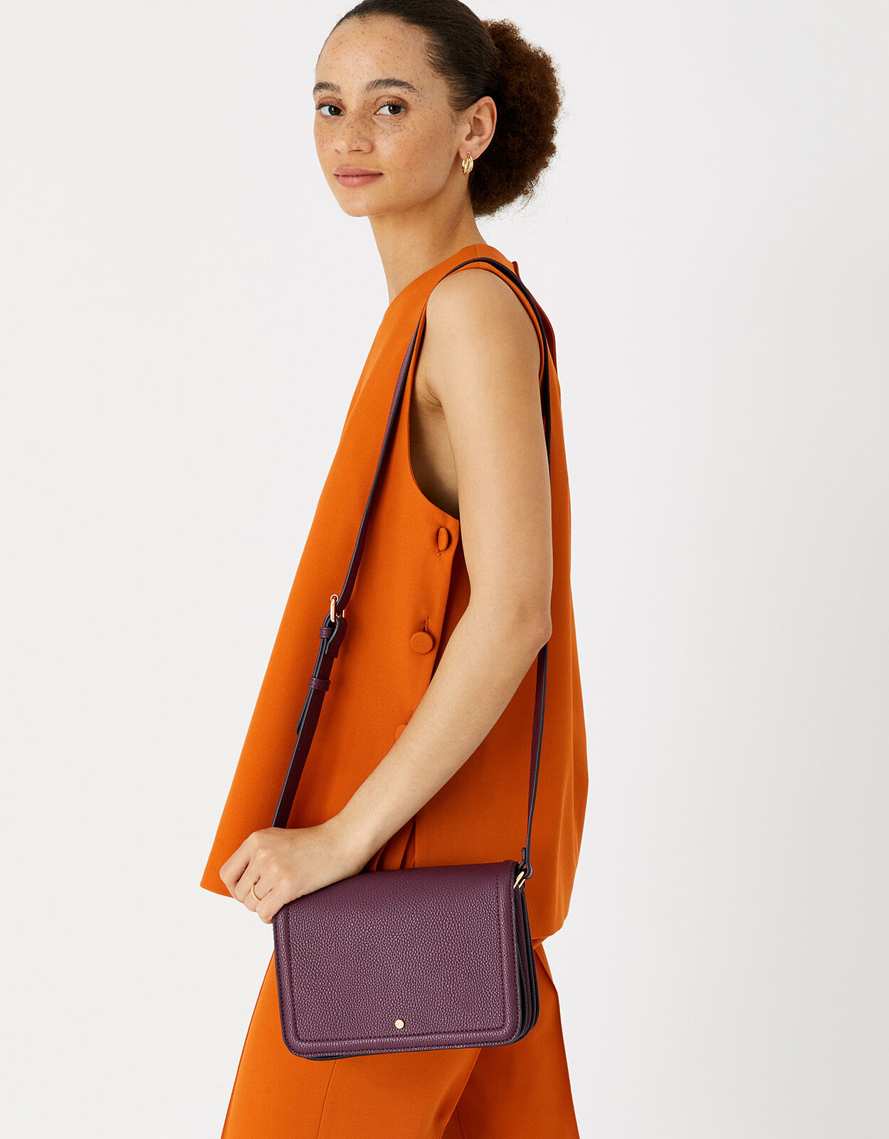 triple compartment cross body bag