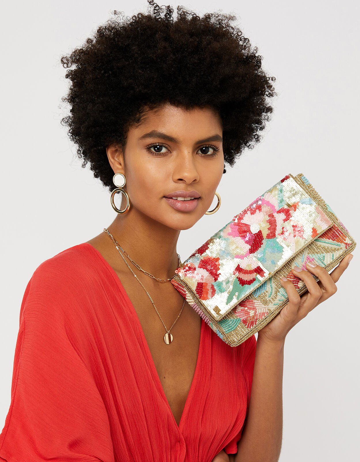 floral embellished clutch bag