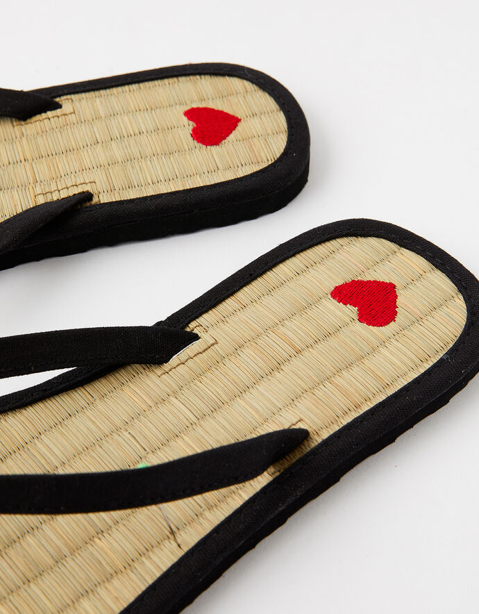 black seagrass flip flops