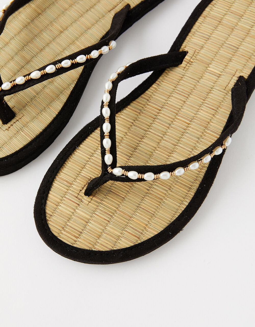 black seagrass flip flops