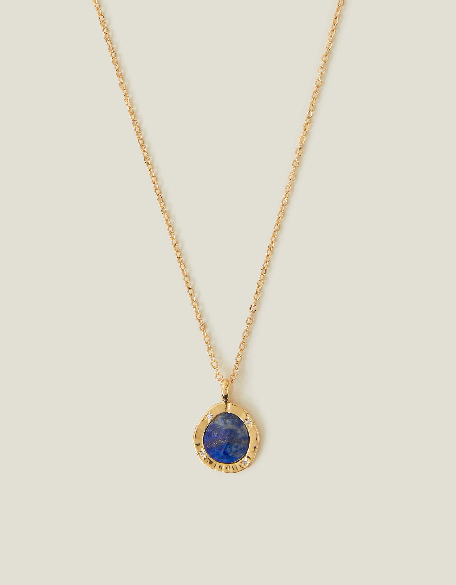 Accessorize gold necklace top