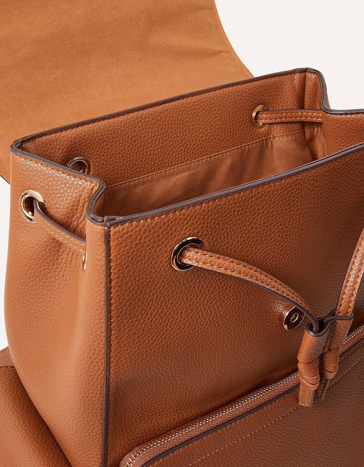Accessorize top tan backpack