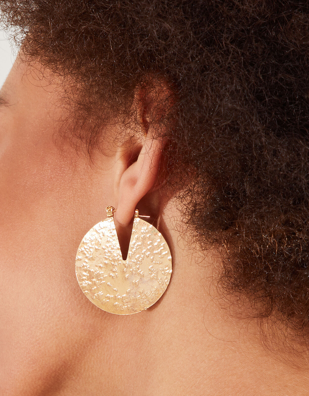 Disc earrings deals