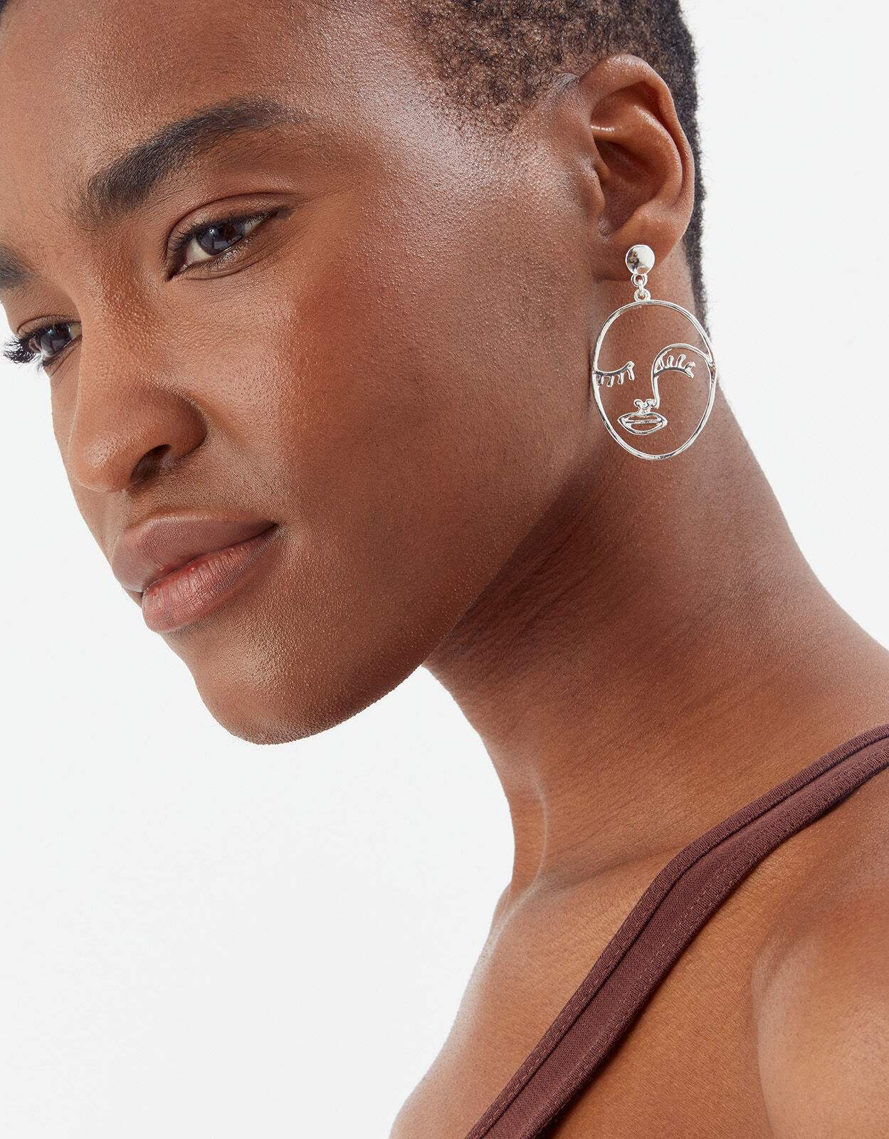 Metal sales face earrings