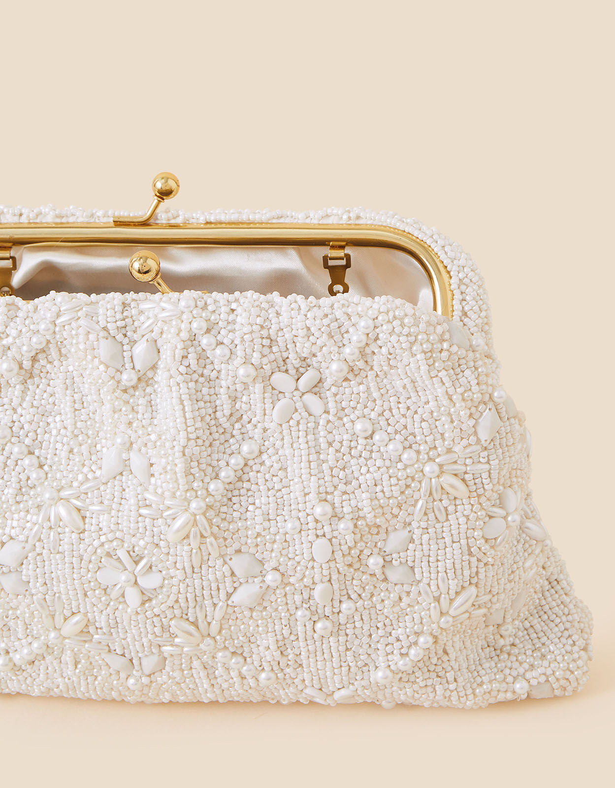 Accessorize beaded clutch sales