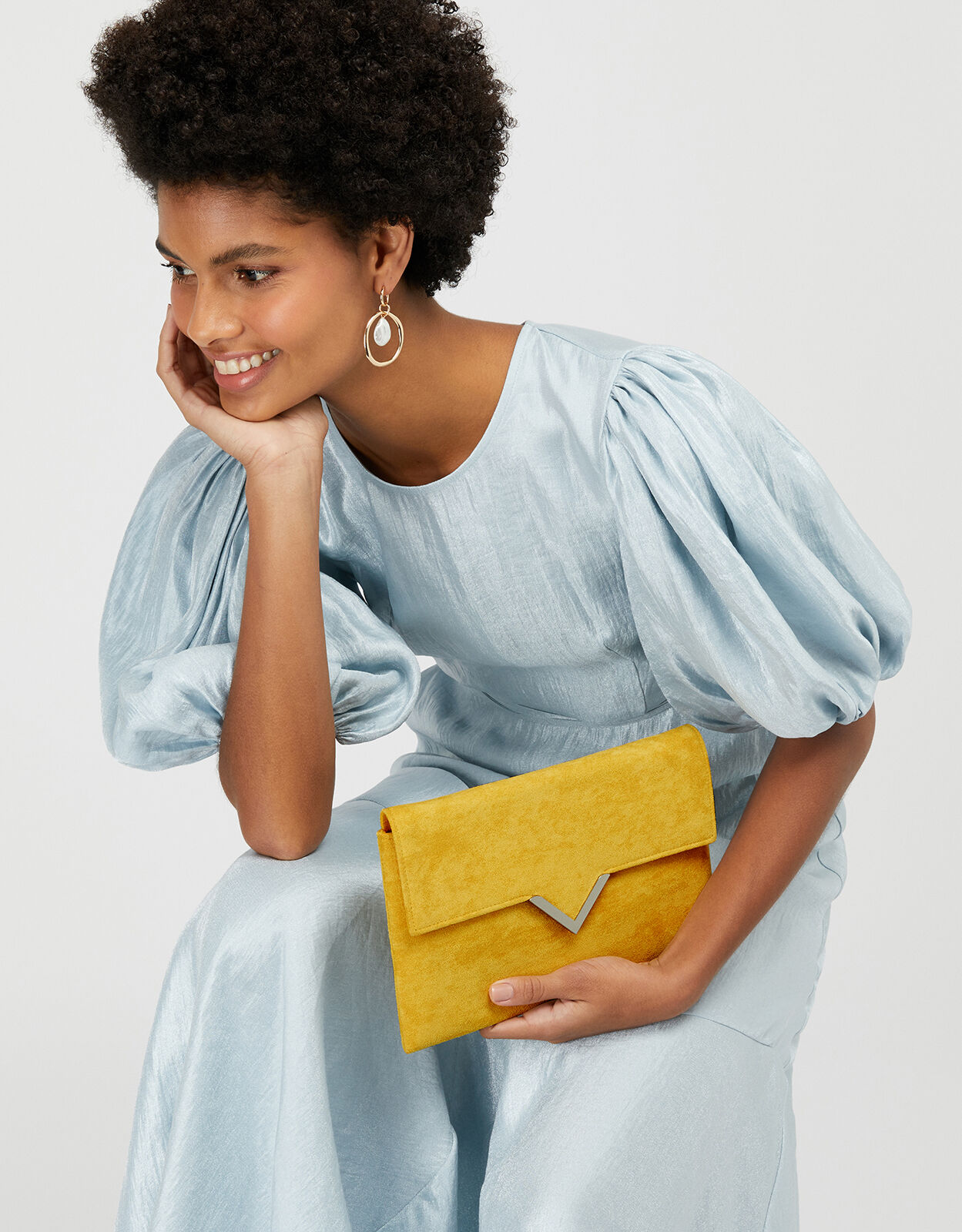 Ochre clutch bag store