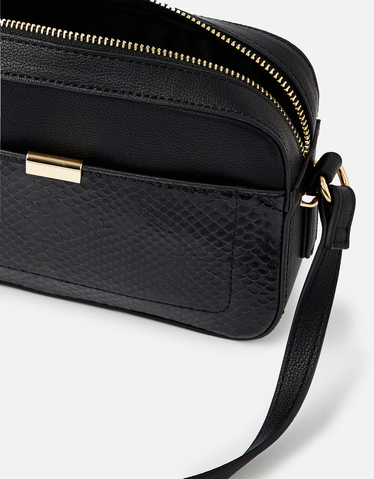 black camera crossbody bag