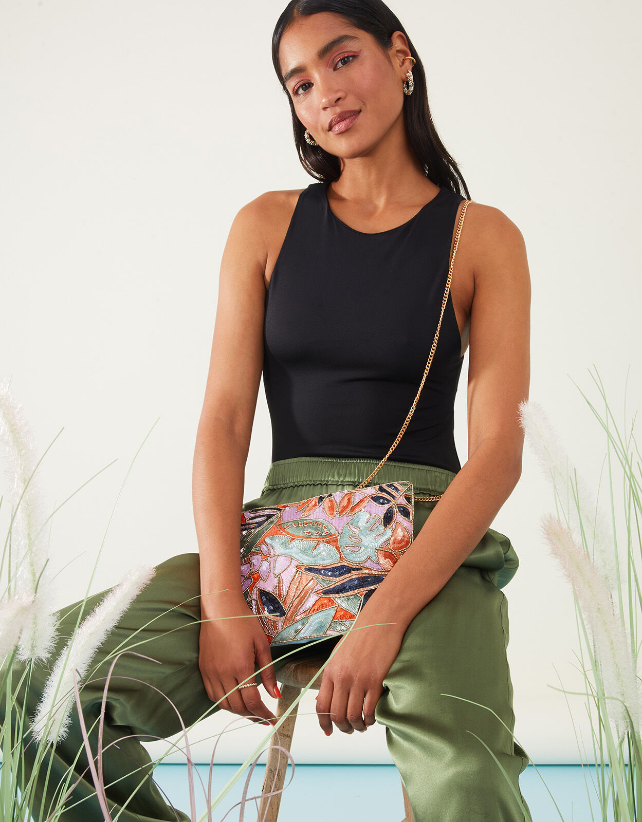 Accessorize embellished clutch shop