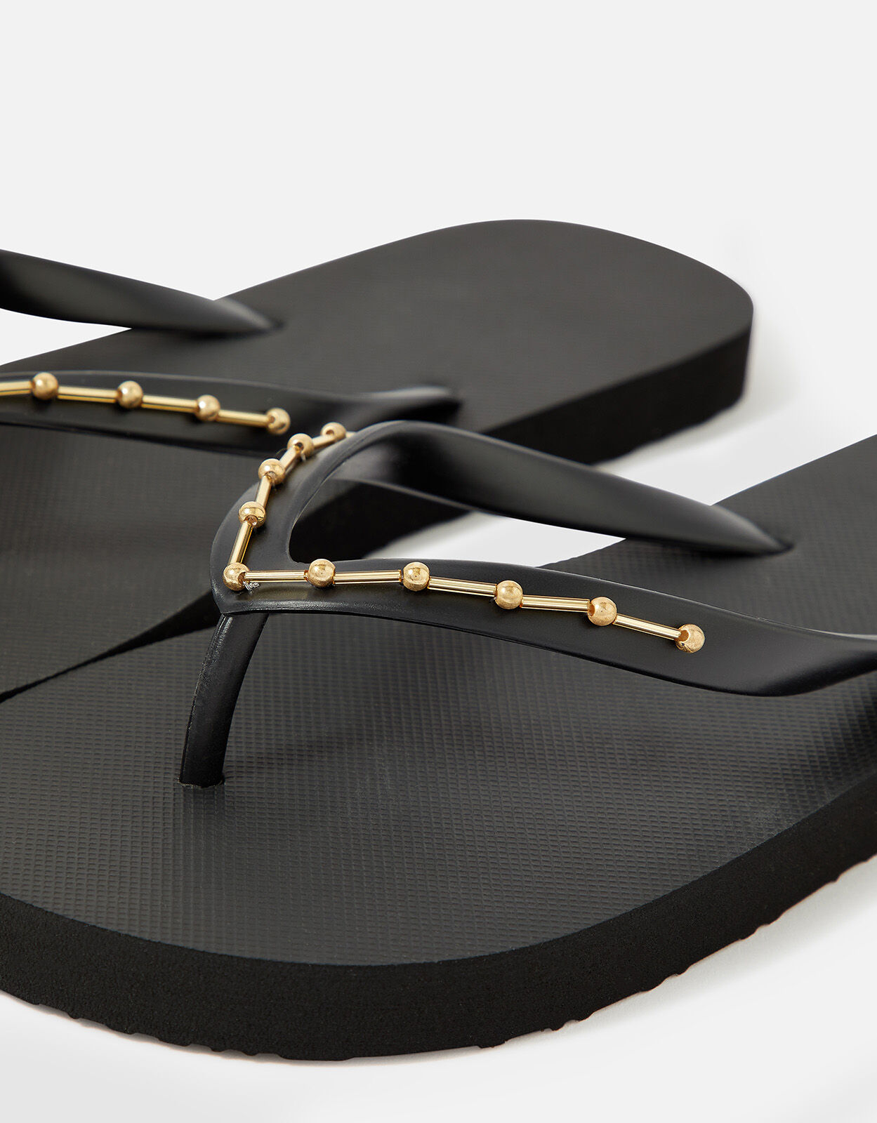Black beaded flip flops on sale