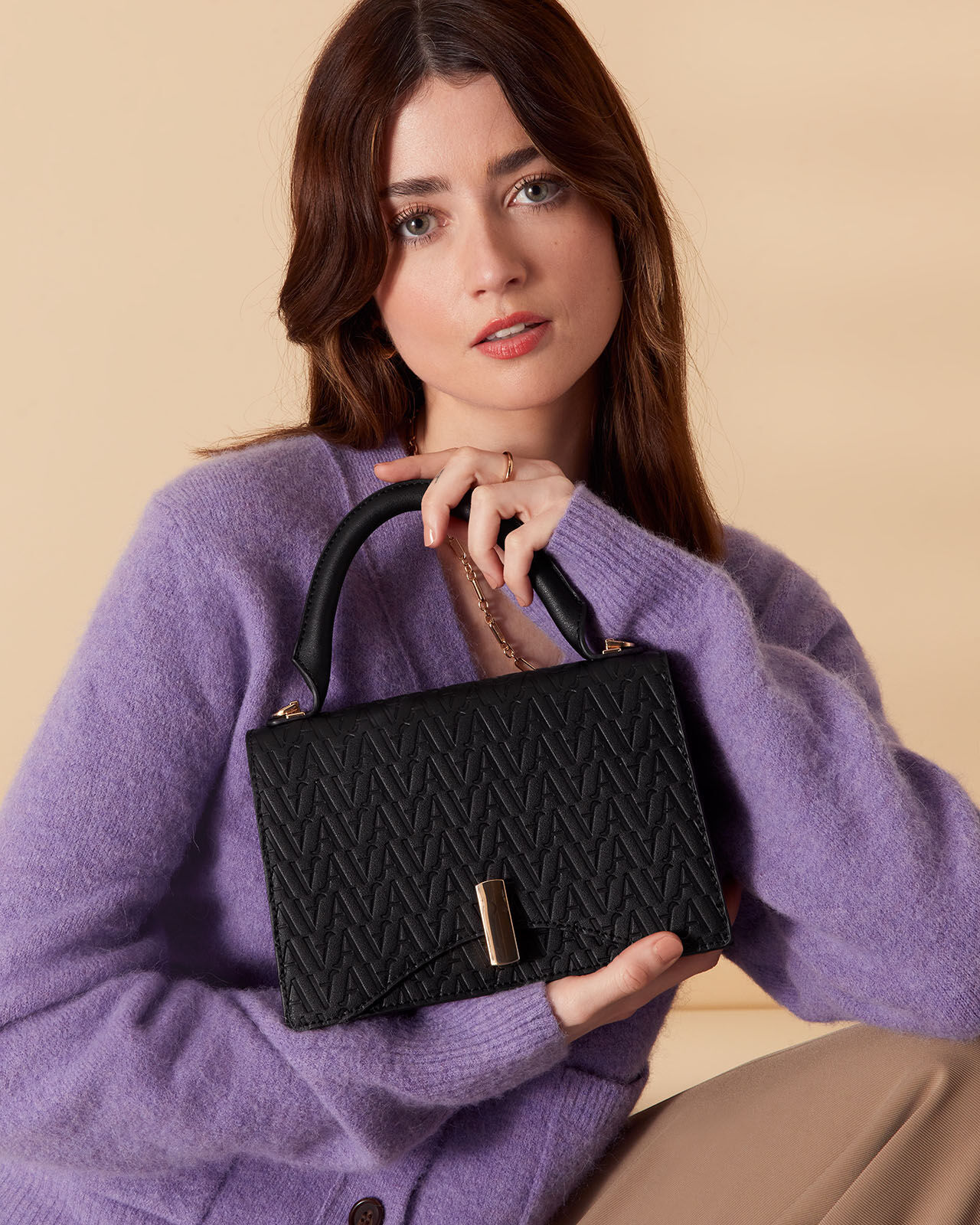 Small Logo Embossed Handheld Bag Black