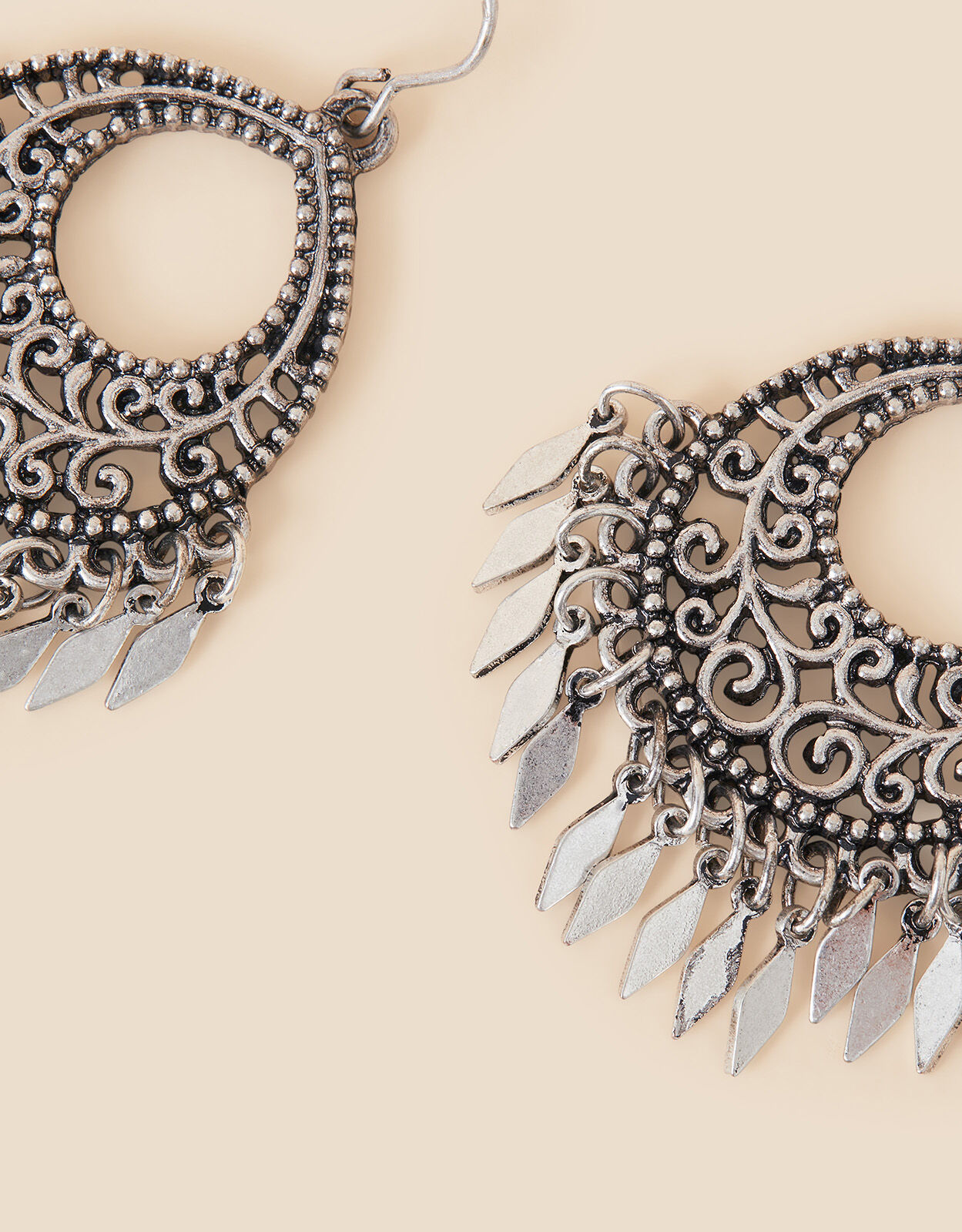 Tassel earrings accessorize top