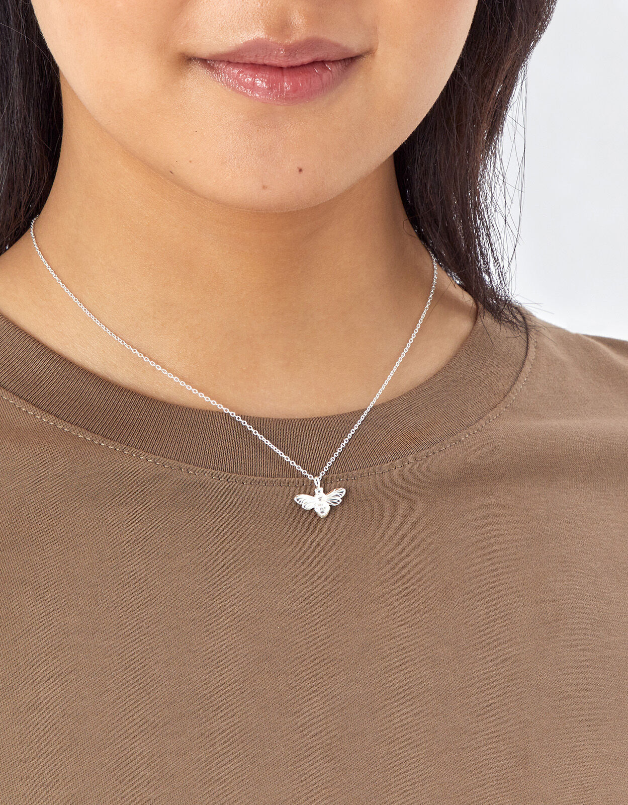 Silver shop bee pendant