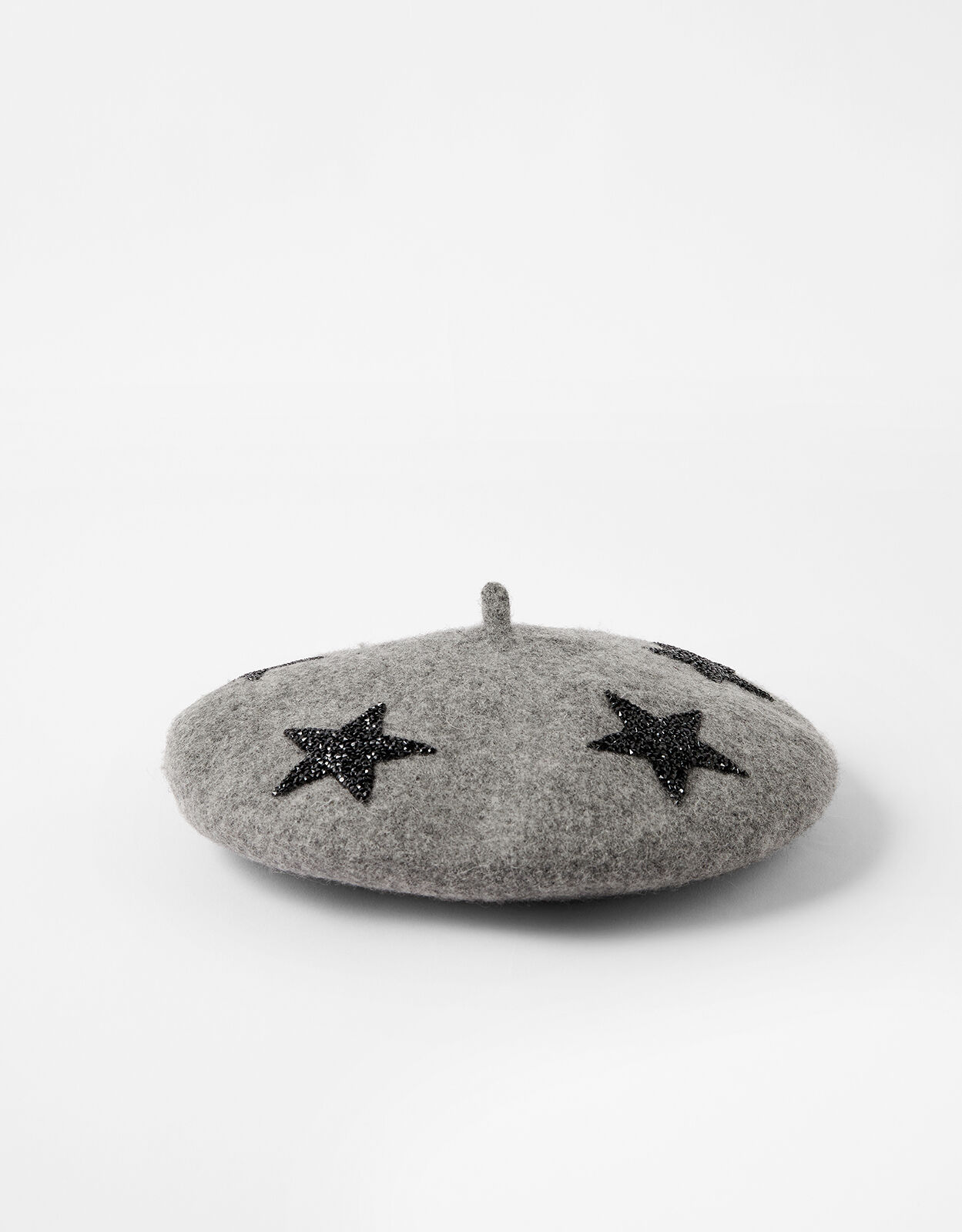 Accessorize beret top