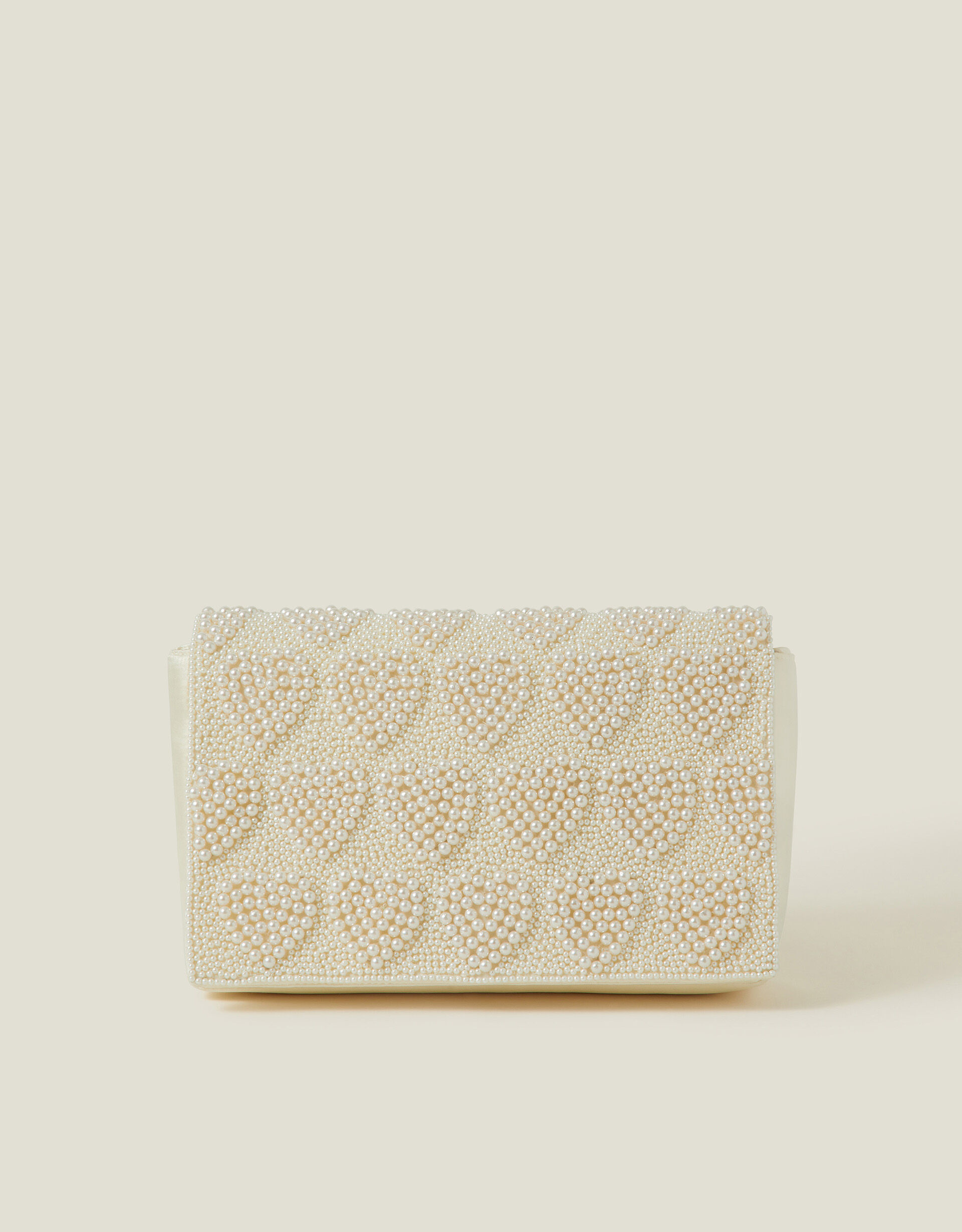 White clutch bag accessorize top