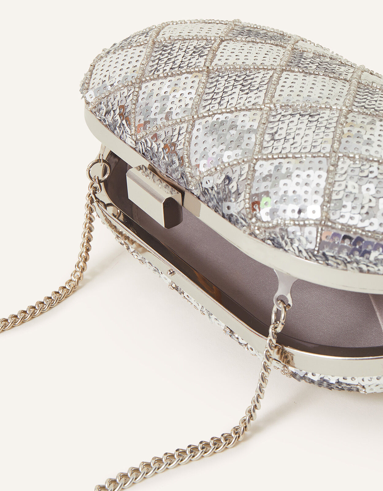 Silver sequin hotsell clutch bag
