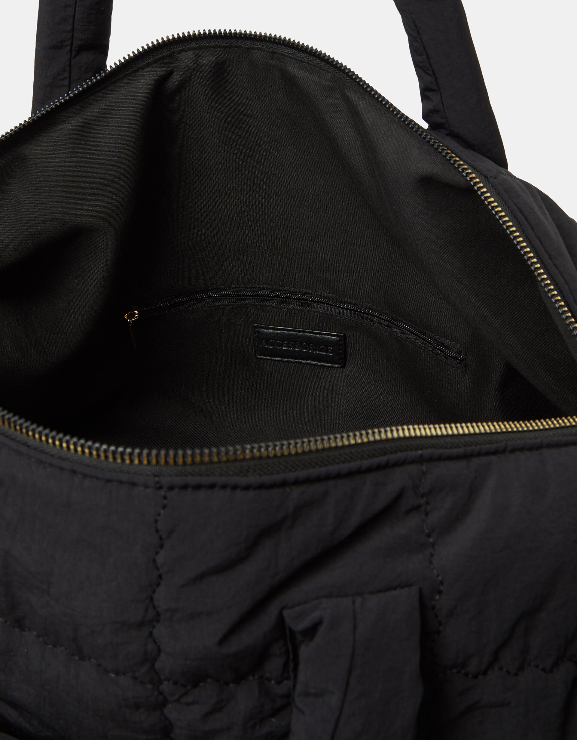 Accent quilting bag／black Quilted Weekend Bag | Travel Bags | Accessorize UK