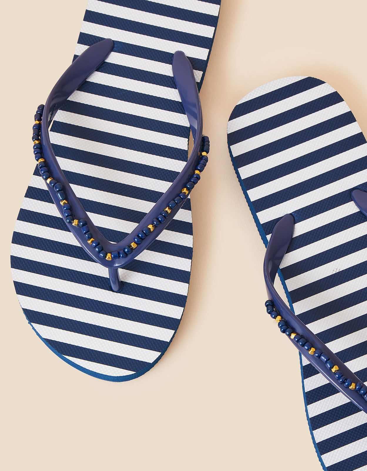 Navy and white flip flops store