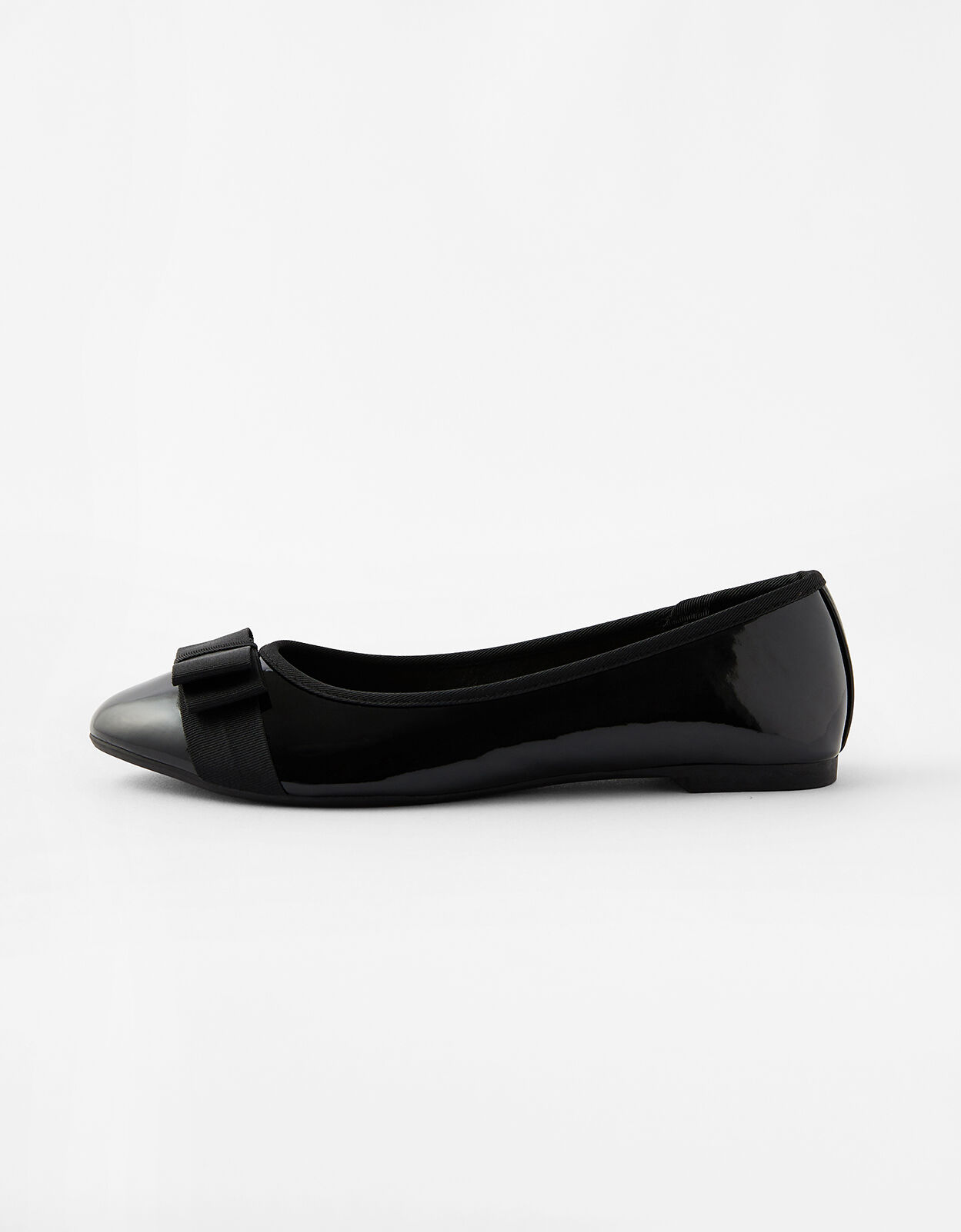 Black flats with 2025 bows